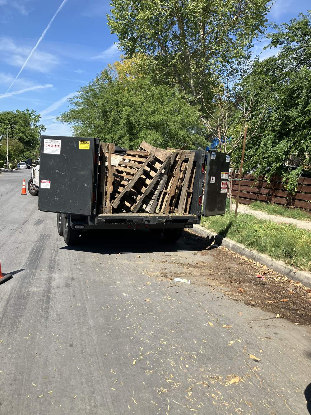 Wood pallets loaded for a commercial cleanout in San Fernando
